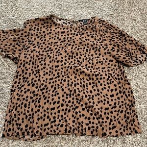 Forever 21 size L cheetah print blouse.